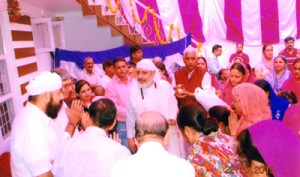 Swami Paul with devotees during Maha Navmi function at Meditation Home, New Plots in Jammu on Thursday.