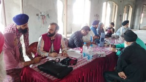 HoD Cardiology Dr Sushil Sharma examining patients at Preet Nagar Gurudwara on Sunday.