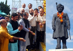 Deputy CM, Dr Nirmal Singh, Minister of Forests and Social Welfare, Bali Bhagat and BJP leaders paying tributes to Maharaja Hari Singh on Accession Day at Jammu on Monday. -Excelsior/Rakesh