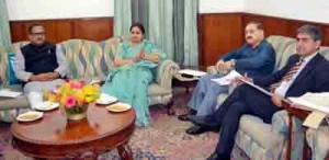 DyCM, Dr Nirmal Singh flanked by MoS for Education, Priya Sethi and others during a meeting at Jammu on Thursday.