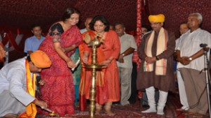 Director DD Kendra Jammu lighting ceremonial lamp during inaugural of Navratra Festival at Lakshmi Narayan Temple Gandhi Nagar, Jammu.