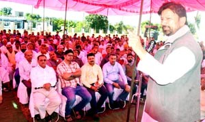Minister for Health, Ch Lal Singh addressing public grievances redressal camp at CHC Basohli on Monday.