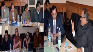 DyCM, Dr Nirmal Singh addressing officers during a meeting at Srinagar on Tuesday.