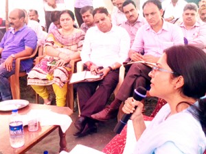 DDC Reasi Sushma Chauhan addressing a public grievances redressal-cum-awareness camp at Pouni in Reasi on Tuesday.