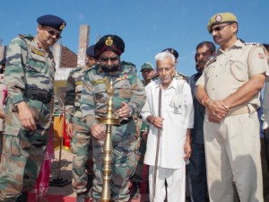 Maj Gen SPS Kochar lighting ceremonial camp during inauguration of free medical camp by Army at Pancheri on Sunday.