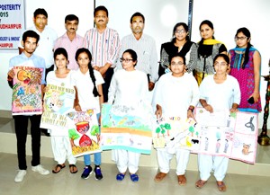 Winners of Poster Making Competition posing alongwith College Management at GCW Udhampur on Wednesday.