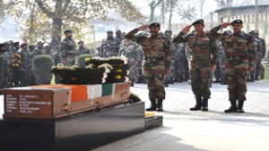 GOC-in-C Northern Command Lt Gen DS Hooda and other officers paying tributes to martyr Col. Santosh at Srinagar on Wednesday.