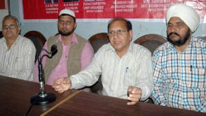 Members of AIBCU interacting with media persons at Jammu on Friday.                      -Excelsior/Rakesh