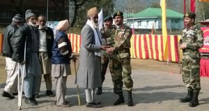 GOC Romeo Force Maj Gen A K Sanyal felicitating veterans during a rally at Surankote in Poonch on Friday.