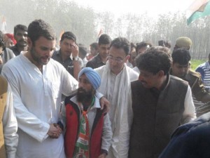 Rahul Gandhi at Sekri Kalan with a Congress supporter.