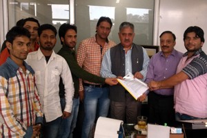 NSF activists submitting a memorandum of demands to CUJ Vice-Chancellor Prof Ashok Aima.