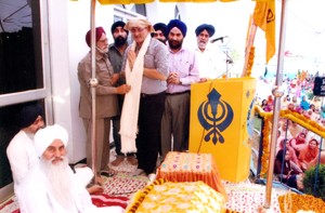 Speaker J&K Assembly Kavinder Gupta being honoured by S Rangil Singh during function at Digiana Ashram in Jammu on Tuesday.