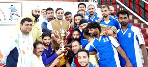 Winners of Football tournament organised by Army in Poonch receiving trophy.