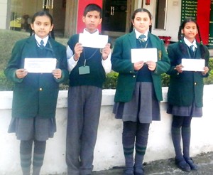 Students displaying certificates at DPS Udhampur on Tuesday. 