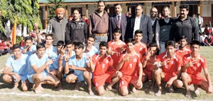 Players posing alongwith dignitaries during Annual Sports Meet at Govt BHSS Udhampur. 