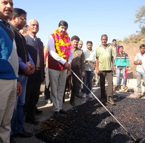 MoS for Finance, Pawan Kumar Gupta launching macadamization work of Tikri-Katra road on Monday.