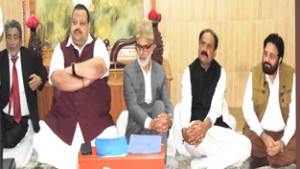 Ali Mohammad Sagar, Devender Singh Rana and other senior NC leaders during a party meeting on Tuesday.