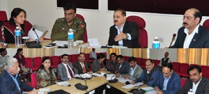 Divisional Commissioner Dr Pawan Kotwal chairing a meeting at Jammu on Thursday.