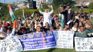 PoK refugees raising slogans during rally at Jammu on Tuesday. -Excelsior/Rakesh