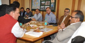 Dy Chief Minister, Dr Nirmal Singh chairing review meeting of ERA at Jammu on Saturday.