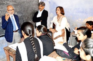 Minister for Education, Naeem Akhtar interacting with students in an educational institution on Monday.