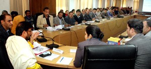 Minister for Health, Ch Lal Singh chairing a meeting at Jammu on Thursday.