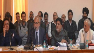 Education Minister Naeem Akhtar chairing Rajouri DDB review meeting.