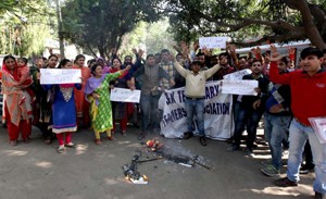 Temporary teachers protesting for continuation of their service at Jammu on Monday. —Excelsior/Rakesh