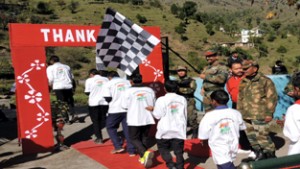 Col Jodhvir Singh flagging off trekking tour of school children as  part of Poonch Link-up Day celebrations at Khanetar on Tuesday.