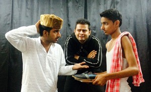 A scene from comedy play ‘Murkh Raju’ staged by Nat Manch at Shakti Nagar in Jammu.