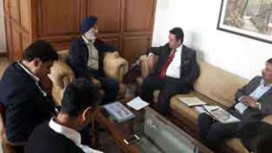 CAPD Minister Ch Zulfkar Ali interacting with his Punjab counterpart at Chandigarh on Monday.