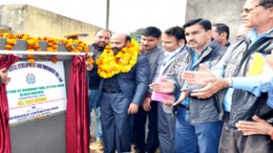 Minister for Forests, Bali Bhagat laying foundation of development work at Jammu on Monday.