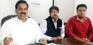 NPP leader Harshdev Singh talking to reporters in Jammu on Sunday. 