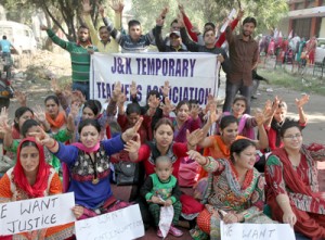 Temporary teachers protesting at Jammu for continuation of their service.—Excelsior/Rakesh