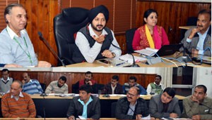 Deputy Commissioner, Simrandeep Singh chairing a meeting at Jammu on Tuesday.