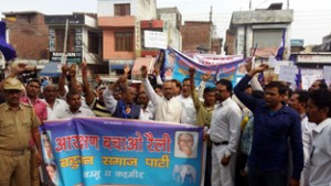 BSP activists taking out protest rally in Kathua on Monday. -Excelsior/Magotra