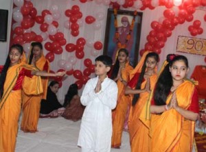 Children reciting Vedic Hymns during celebrations of 90th Birthday of Bhagwan Sai Baba at Sai Dham, Talab Tillo in Jammu.  -Excelsior/Rakesh