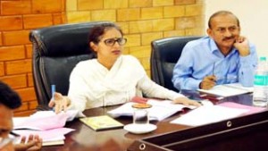 JMC Commissioner Mandeep Kaur chairing a review meeting in Conference Hall of JMC on Wednesday.