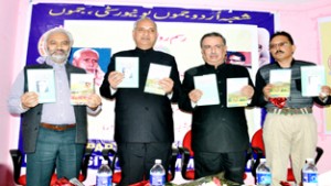 Dignitaries releasing book ‘Qudrut-ullah-Shahab Shaksyat aur Fun’ written by Prof Shohab Inayat Malik at JU.