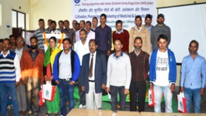 CSIR-IIIM scientists and farmers during training programme under JAAG project at Udhampur on Tuesday.