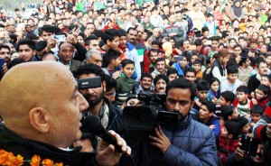 Cine Star Anupam Kher addressing a public meeting at Jagti township on Friday. — Excelsior/Rakesh