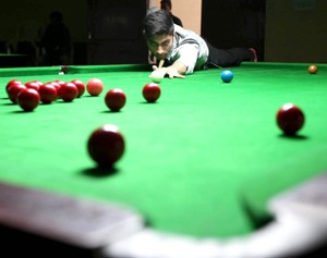 Jitandrya aiming a shot during a semifinal match of Sub Junior Snooker at Billiards Hall, MA Stadium in Jammu. —Excelsior/Rakesh