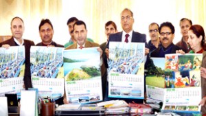 Secretary Tourism, Farooq Ahmad Shah and others releasing LSDA calendar at Jammu.