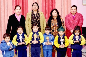 Winners of Show & Tell Competition posing along with School Management at DPS in Jammu. 