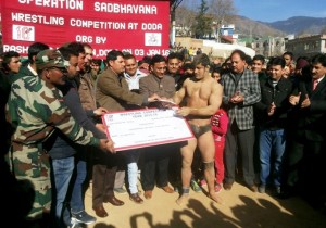 Wrestlers being felicitated by the dignitaries during Wrestling Competition organized by Army at Doda.  