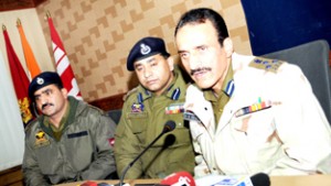 DIG Ghulam Hassan Bhat along with senior police officials addressing a press conference in Srinagar. -Excelsior/ Amin War
