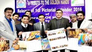 Commissioner Secretary Industries and Commerce Shailendra Kumar and others releasing calendar of Handicrafts Department on Tuesday.