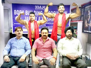 Ace Bodybuilders Dhananjay Singh Charak and Vimal Jit Singh posing along with office bearers of the Association after excelling in Nationals.