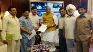 Member Parliament, Jugal Kishore Sharma alongwith West Pak refugees submitting a memorandum to Union Home Minister, Rajnath Singh in New Delhi on Friday.