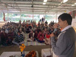 MLA Pawan Gupta addressing a public meeting on Tuesday.